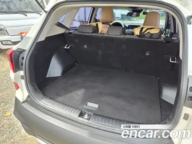 Kia Seltos 2021 — ფოტო 15/18