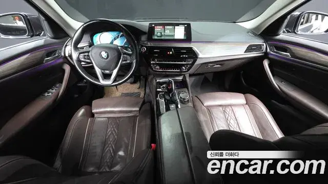 BMW 5 Series 2018 — Фото 7/20