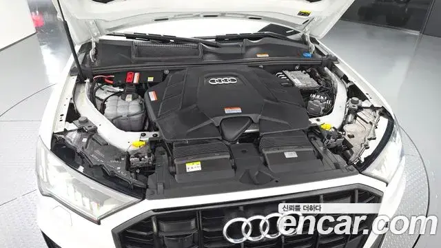 Audi Q7 2023 — Фото 6/20