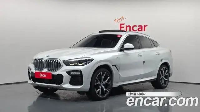BMW X6 2021 — Фото 1/20