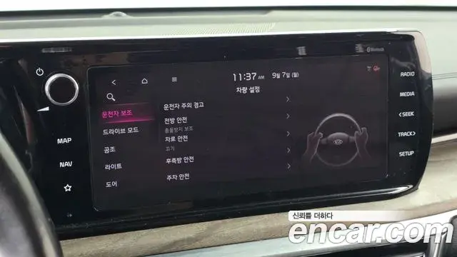 Kia K5 2019 — ფოტო 29/31