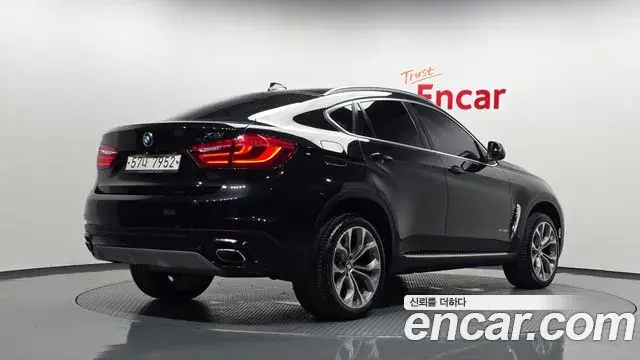 BMW X6 2018 — Фото 2/20