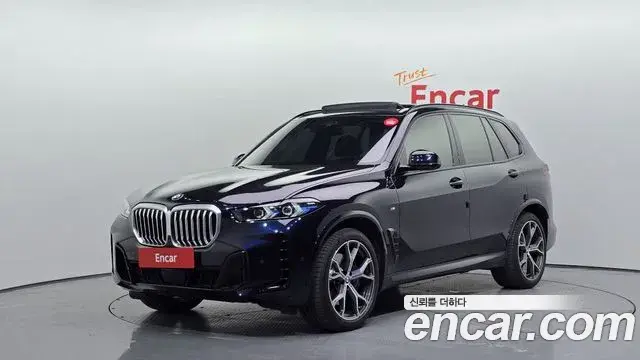 BMW X5 2024 — Фото 1/20