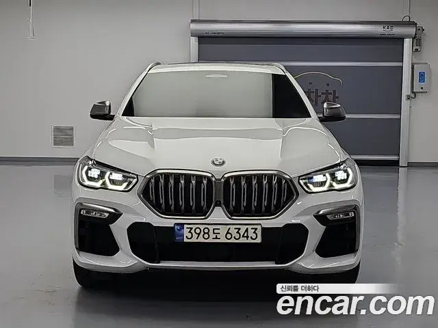 BMW X6 2021 — Фото 1/19