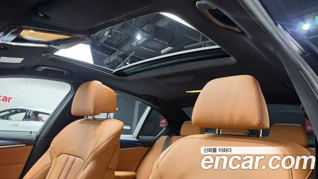 BMW 5 Series 2023 — Фото 16/20