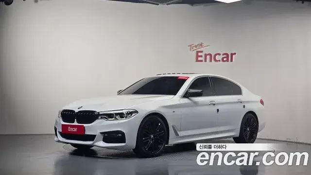 BMW 5 Series 2018 — Фото 11/20