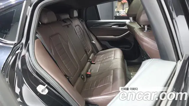 BMW X4 2021 — Фото 12/20