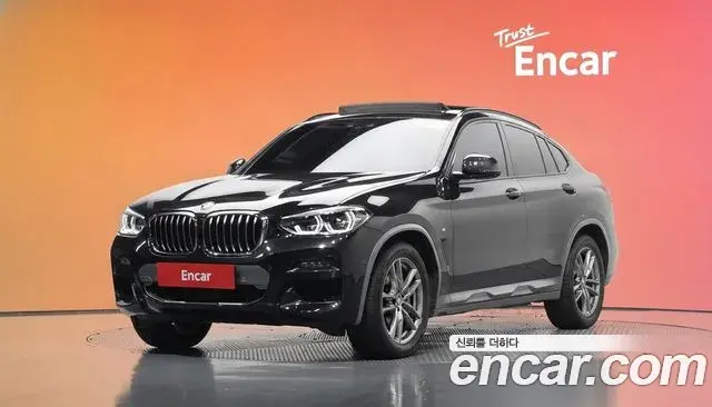 BMW X4 2021 — Фото 1/20