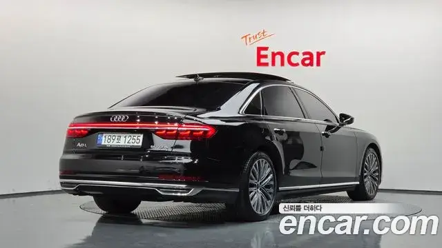 Audi A8 2021 — Фото 2/20
