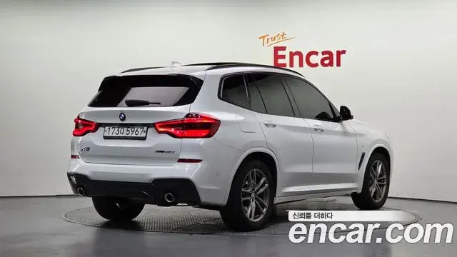 BMW X3 2019 — Фото 1/20