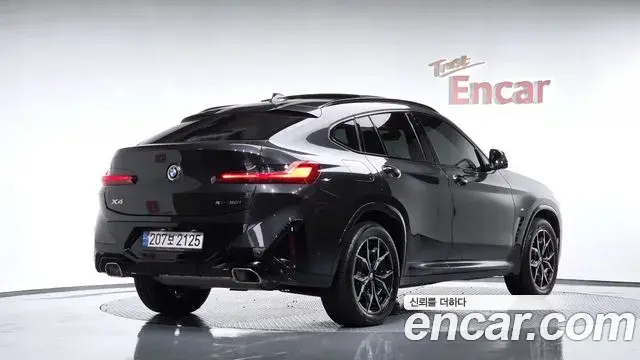 BMW X4 2022 — Фото 2/20