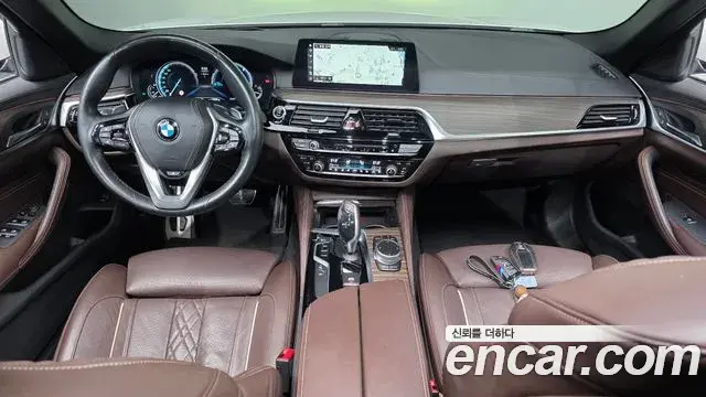 BMW 5 Series 2018 — Фото 7/20