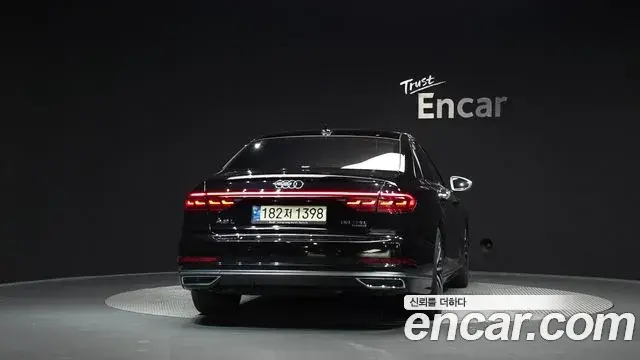 Audi A8 2021 — Фото 4/20