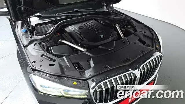 BMW 7 Series 2019 — Фото 6/20