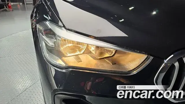 BMW X1 2022 — ფოტო 13/31