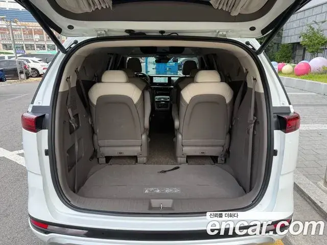 Kia Carnival 2022 — Фото 19/20
