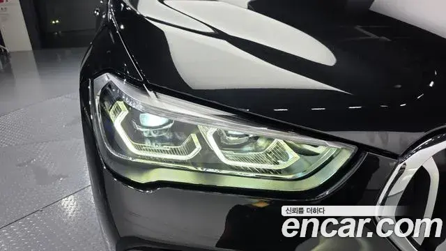 BMW X1 2021 — Şəkil 28/32