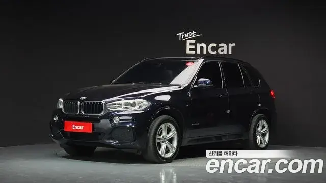BMW X5 2018 — Фото 1/20
