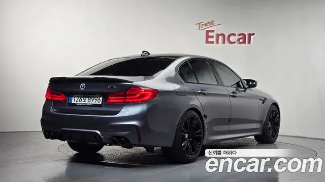 BMW M5 2019 — ფოტო 27/34