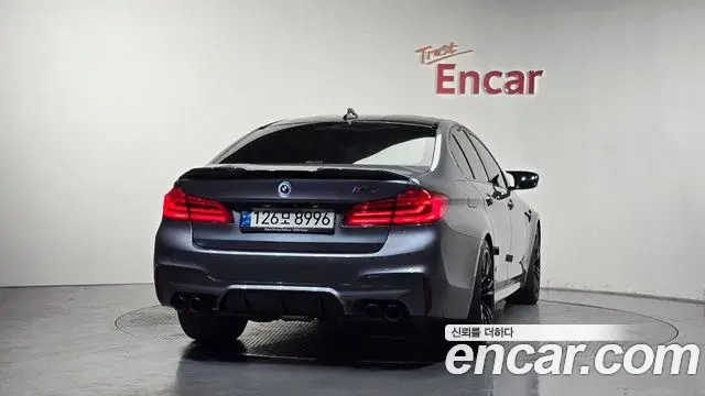 BMW M5 2019 — ფოტო 29/34