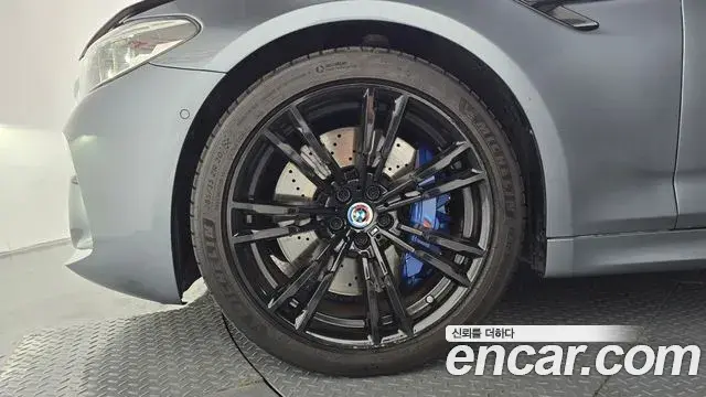 BMW M5 2019 — ფოტო 11/34