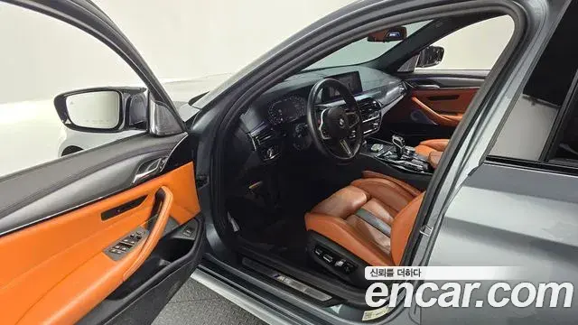 BMW M5 2019 — ფოტო 23/34