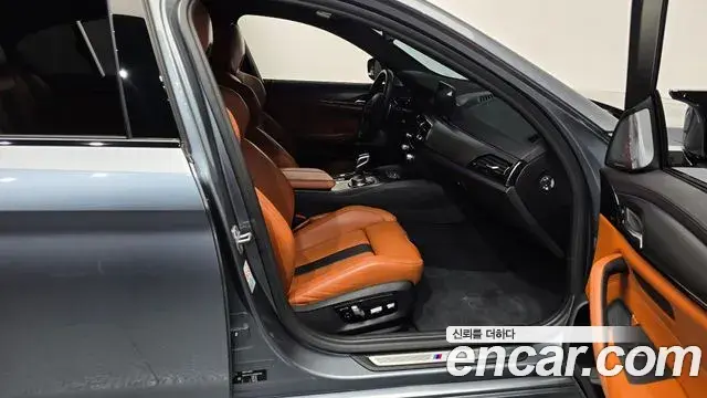 BMW M5 2019 — ფოტო 21/34