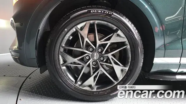 Genesis GV70 2021 — ფოტო 17/34