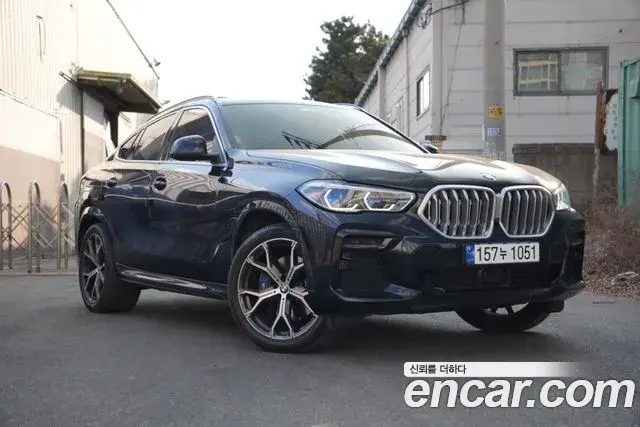 BMW X6 2023 — Фото 1/19