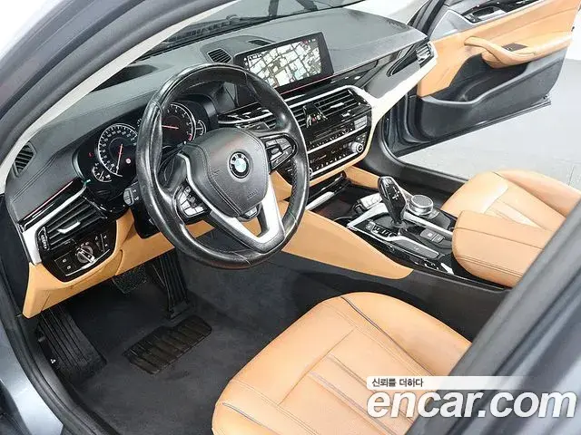 BMW 5 Series 2018 — Фото 14/19