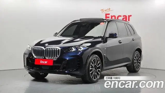 BMW X5 2023 — Фото 1/20