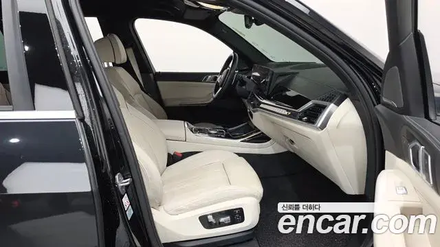 BMW X7 2023 — Фото 11/20