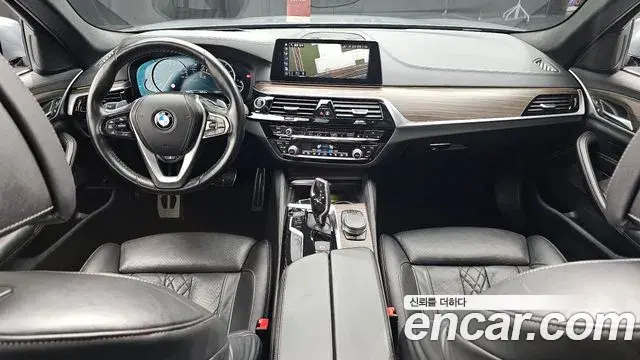 BMW 5 Series 2018 — Фото 7/20