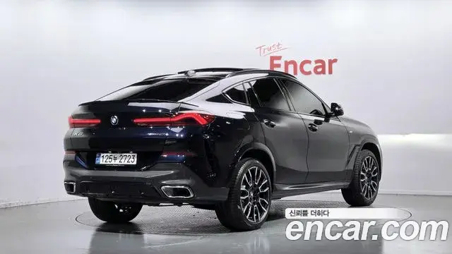 BMW X6 2024 — Фото 1/20