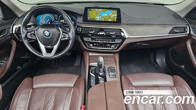 BMW 5 Series 2018 — Фото 7/20