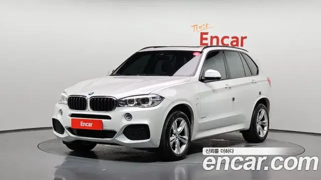 BMW X5 2018 — Фото 1/20