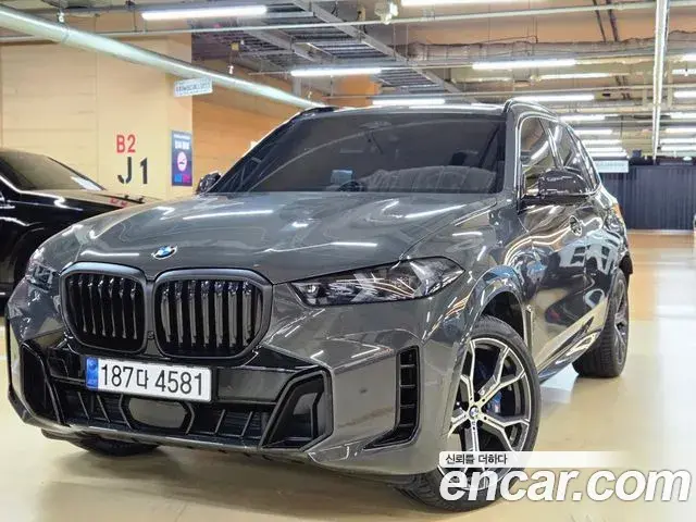 BMW X5 2025 — Фото 1/12
