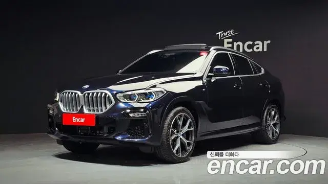 BMW X6 2021 — Фото 1/20