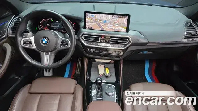 BMW X4 2022 — Фото 10/20