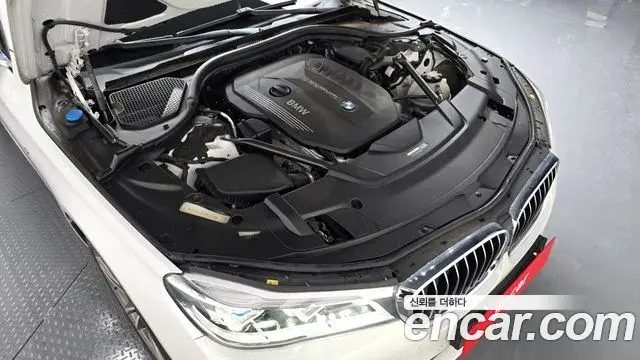 BMW 7 Series 2018 — Фото 6/20