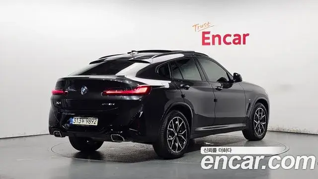 BMW X4 2023 — Фото 2/20