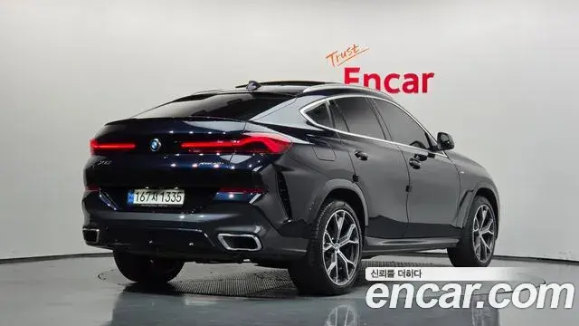 BMW X6 2022 — Фото 2/20