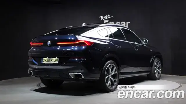 BMW X6 2023 — Фото 2/20