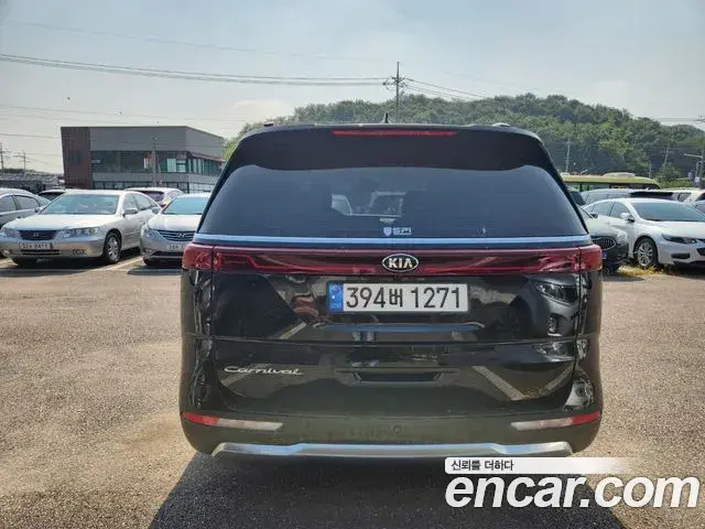 Kia Carnival 2021 — Фото 2/20