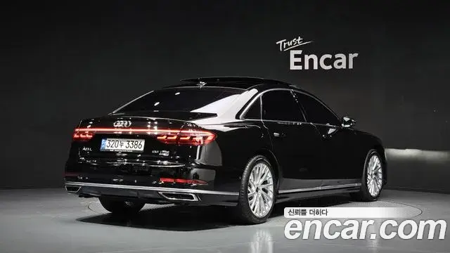 Audi A8 2021 — Фото 2/20