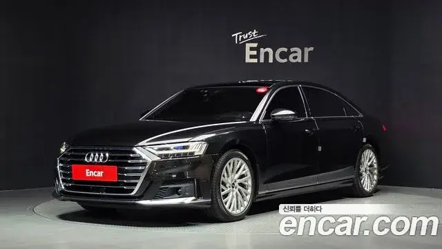 Audi A8 2021 — Фото 1/20
