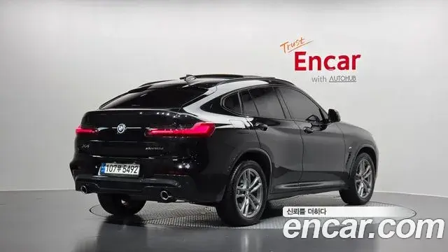 BMW X4 2021 — Фото 2/20