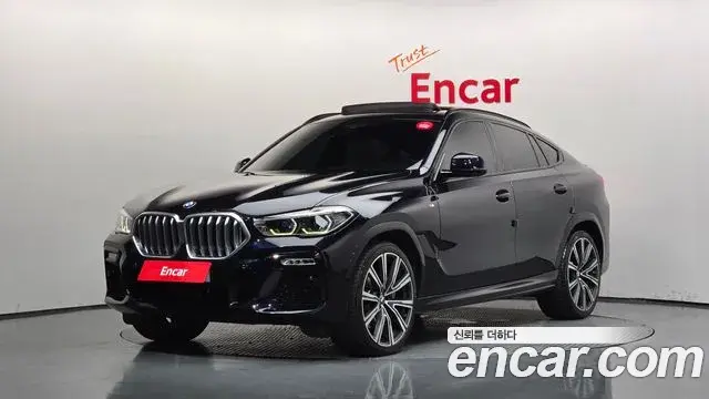 BMW X6 2021 — Фото 1/20