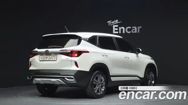 Kia Seltos 2021 — ფოტო 16/20