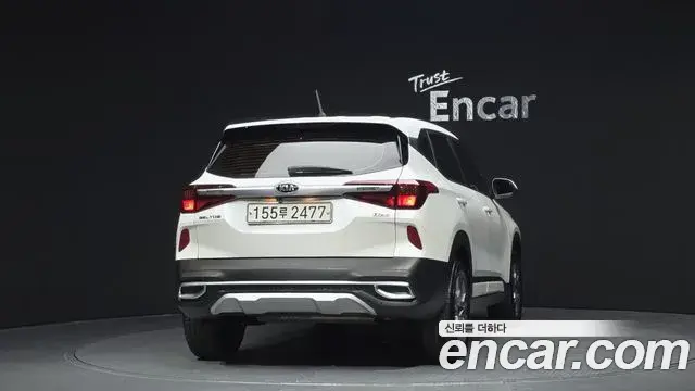 Kia Seltos 2021 — ფოტო 19/20